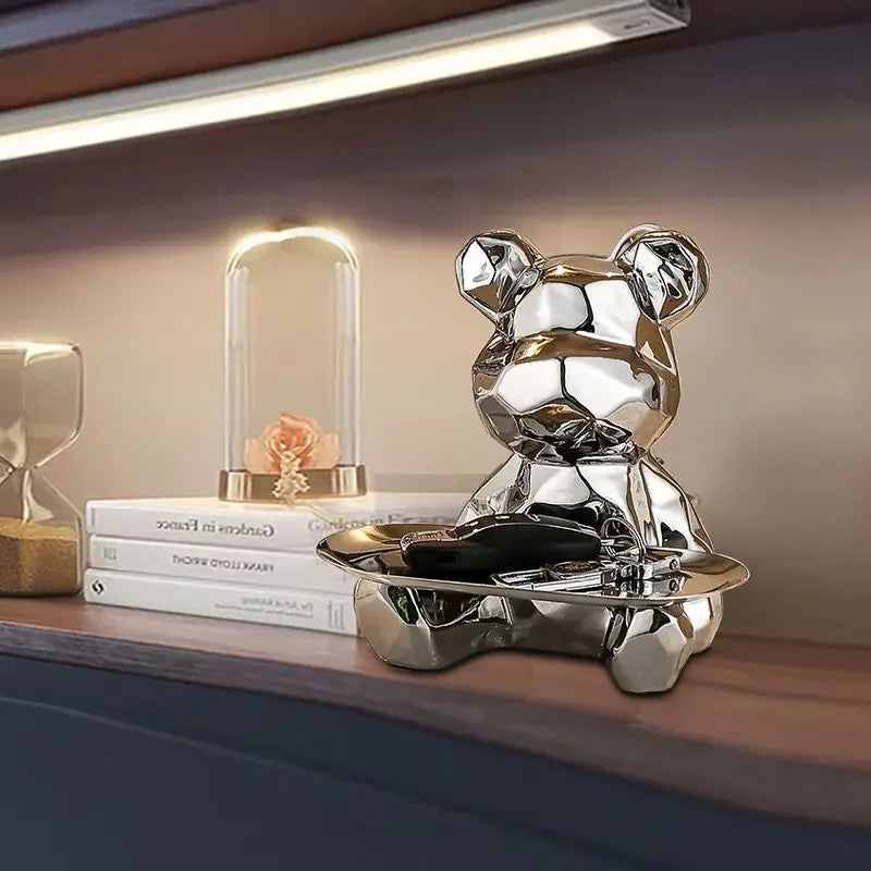 Geometrische Bärenstatue mit Tablettaufbewahrung